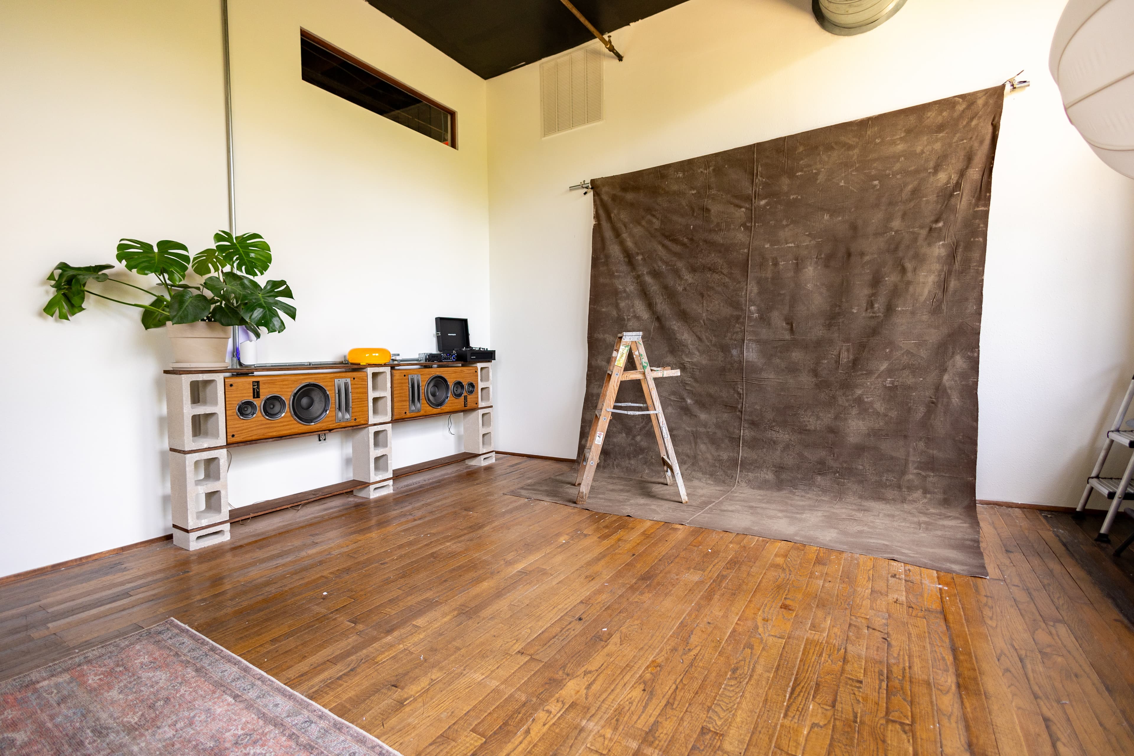 Manna Haus backdrop and audio equipment